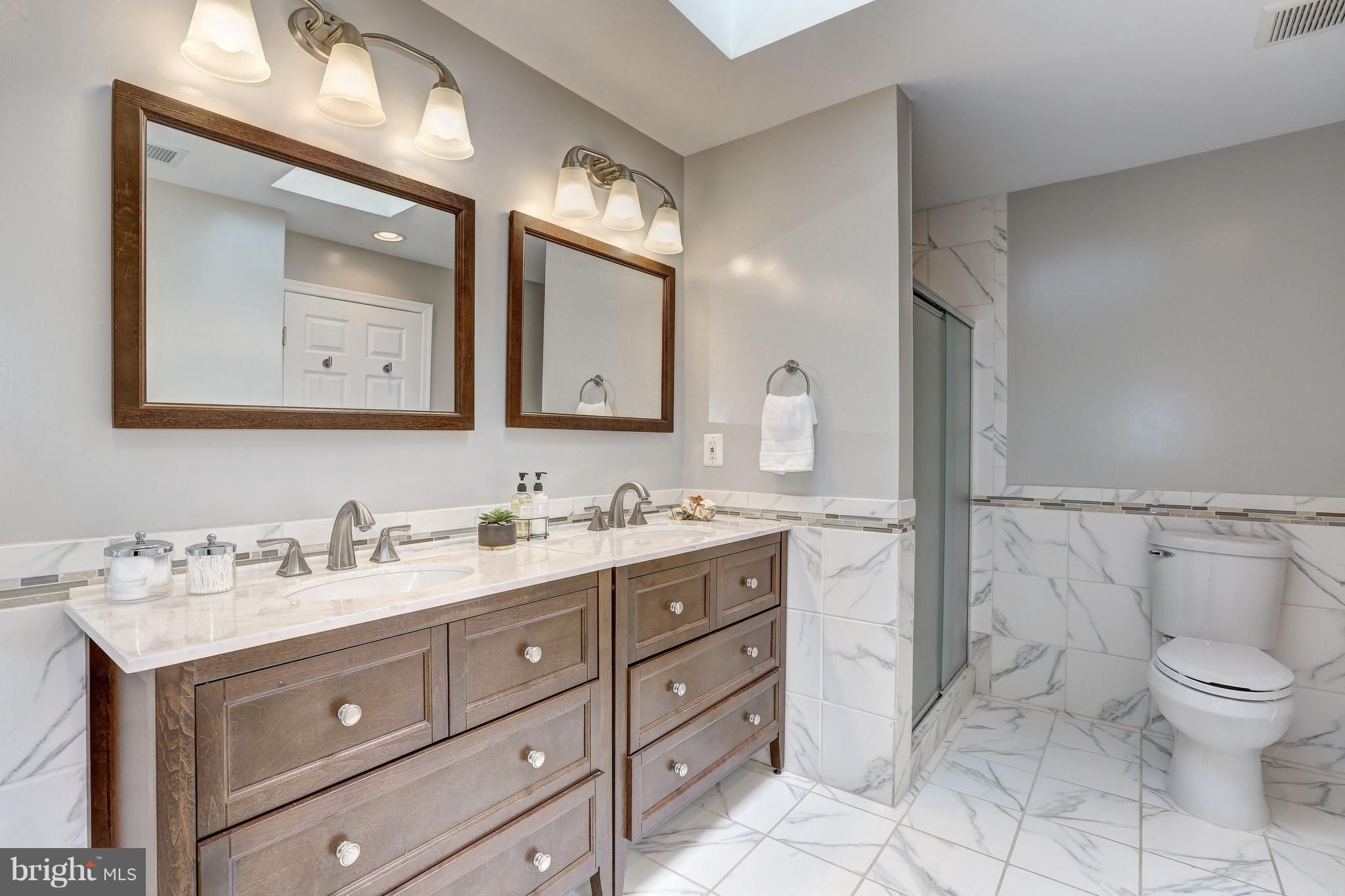 4908 River Road Bethesda, MD 20816 - Photo 13 of 26 Spa-like bath w/2 sinks, tub & separate shower