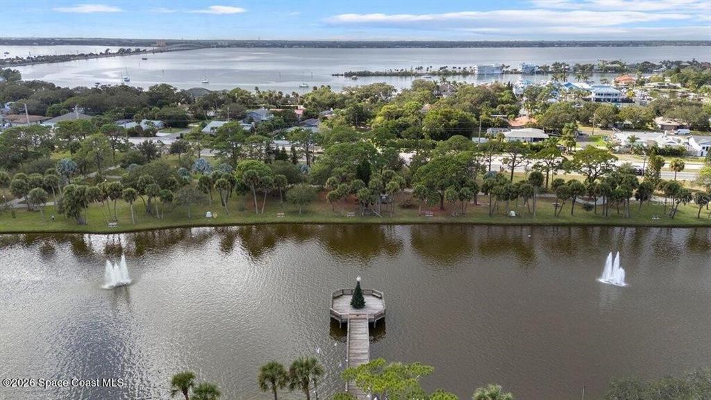 3271 Titanic Circle, Unit 39 Indialantic, FL 32903 - Photo 57 of 60 a view of a lake with a city