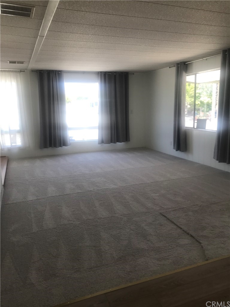 44717 Woodrow Way Hemet, CA 92544 - Photo 7 of 15 a view of empty room with window