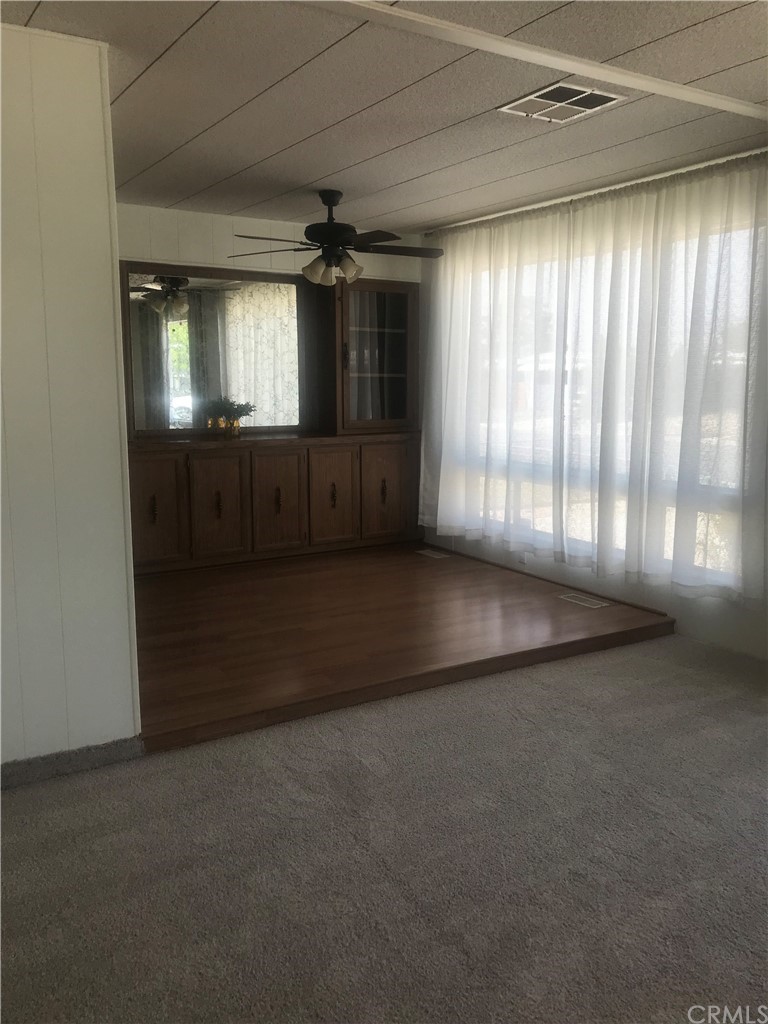44717 Woodrow Way Hemet, CA 92544 - Photo 9 of 15 a view of an empty room with a window