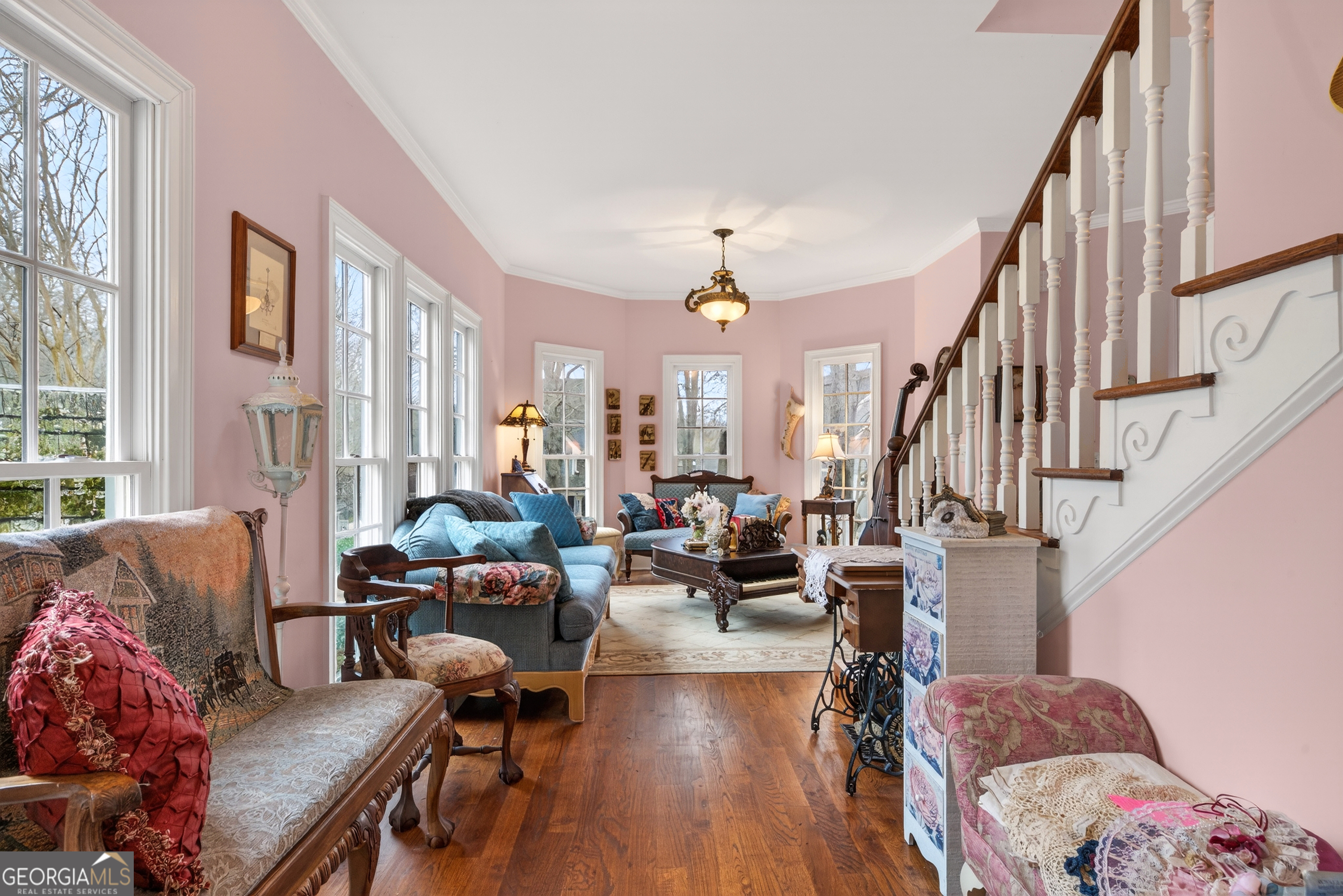 516 Hillside Road Madison, GA 30650 - Photo 11 of 27 a living room with furniture fireplace and a large window