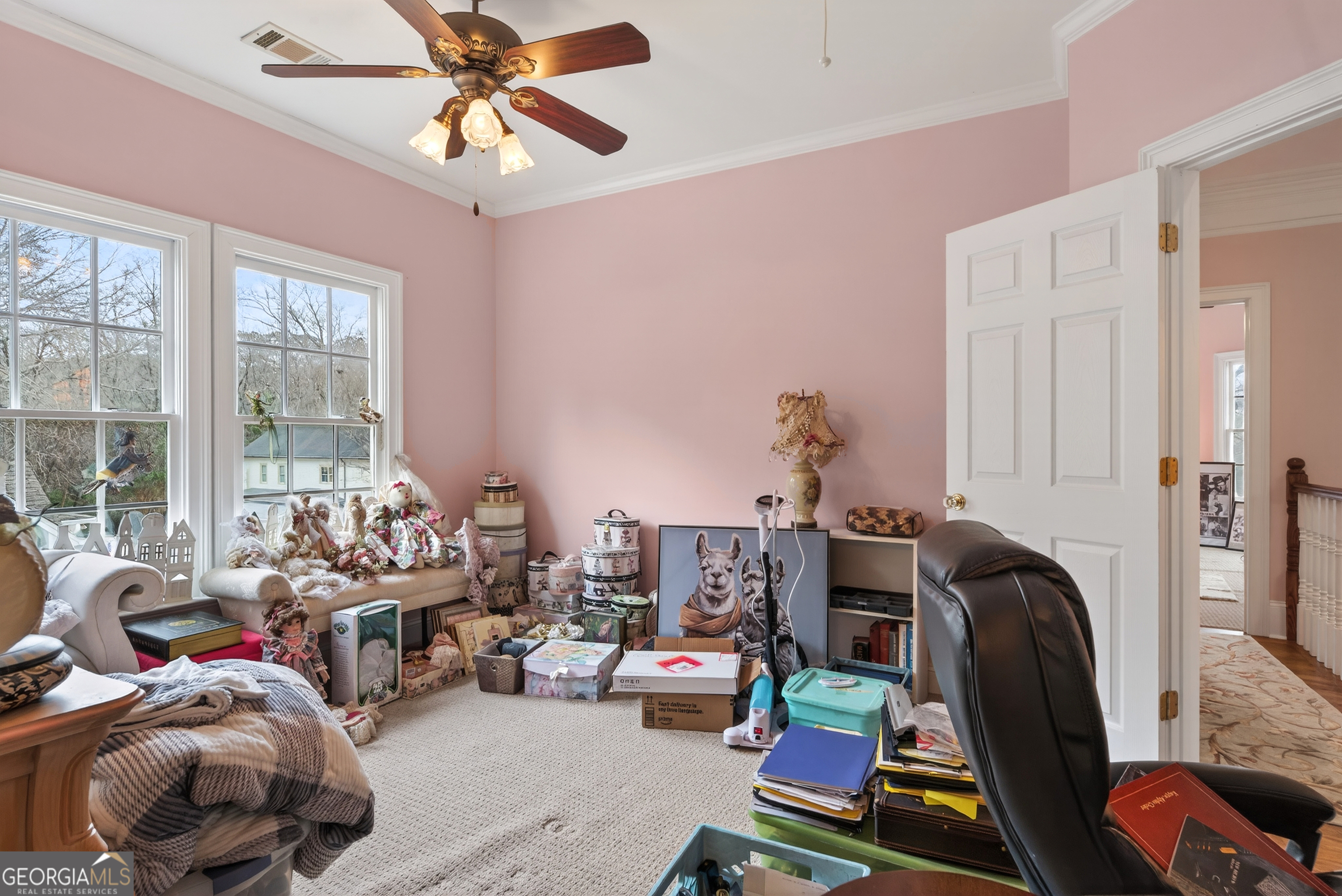 516 Hillside Road Madison, GA 30650 - Photo 16 of 27 a bedroom with furniture and a window