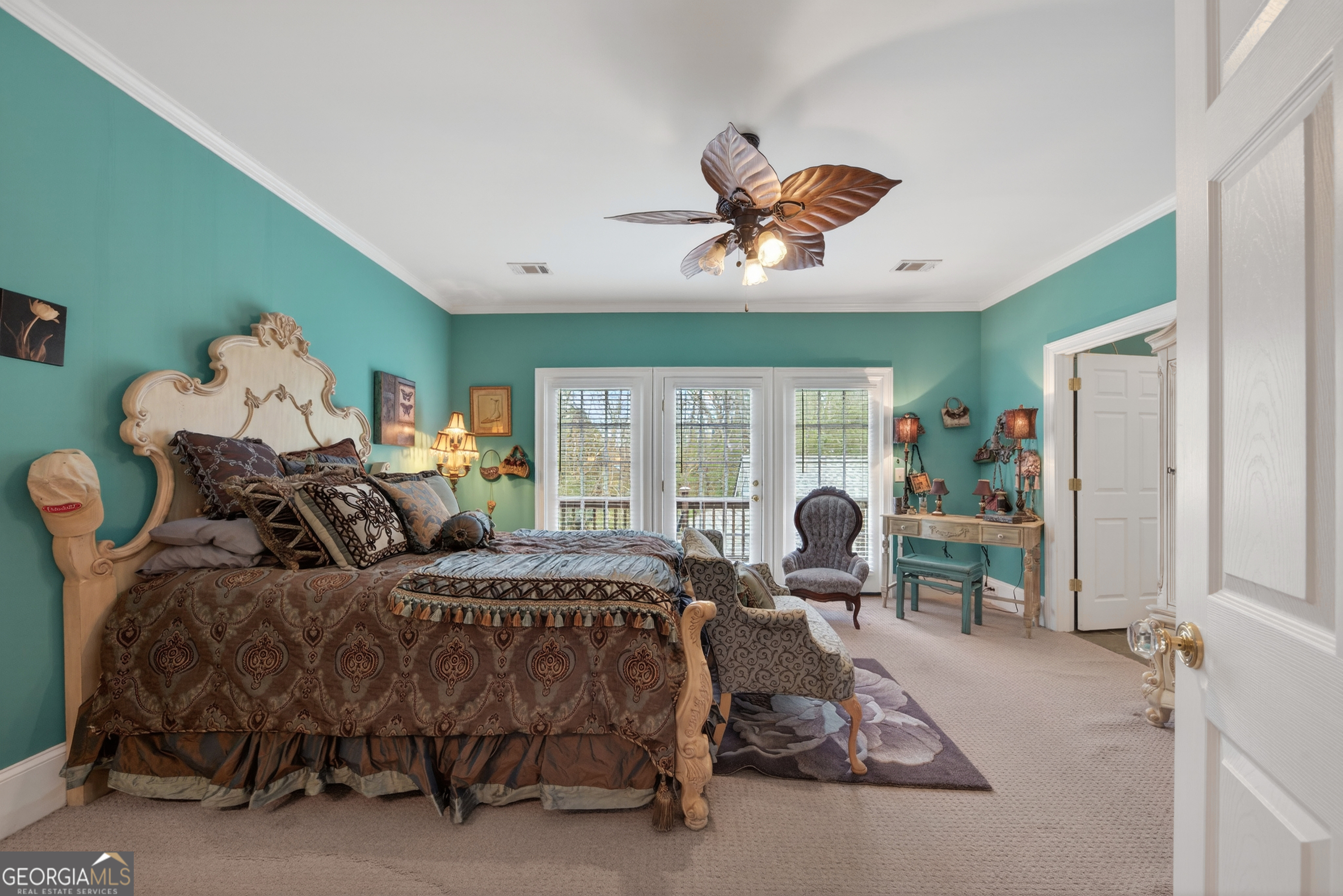 516 Hillside Road Madison, GA 30650 - Photo 17 of 27 a bedroom with furniture and a window
