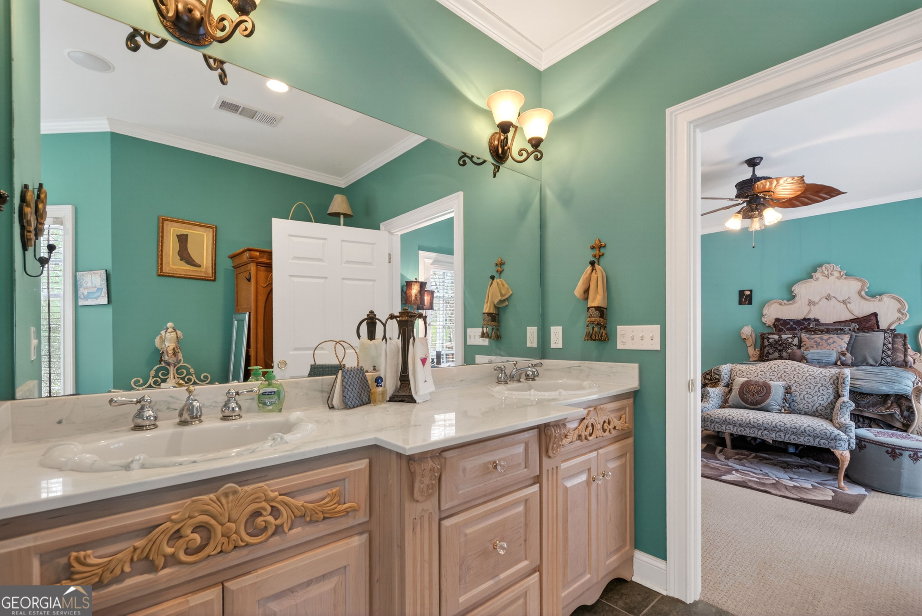 516 Hillside Road Madison, GA 30650 - Photo 20 of 27 a bathroom with a sink double vanity and a mirror