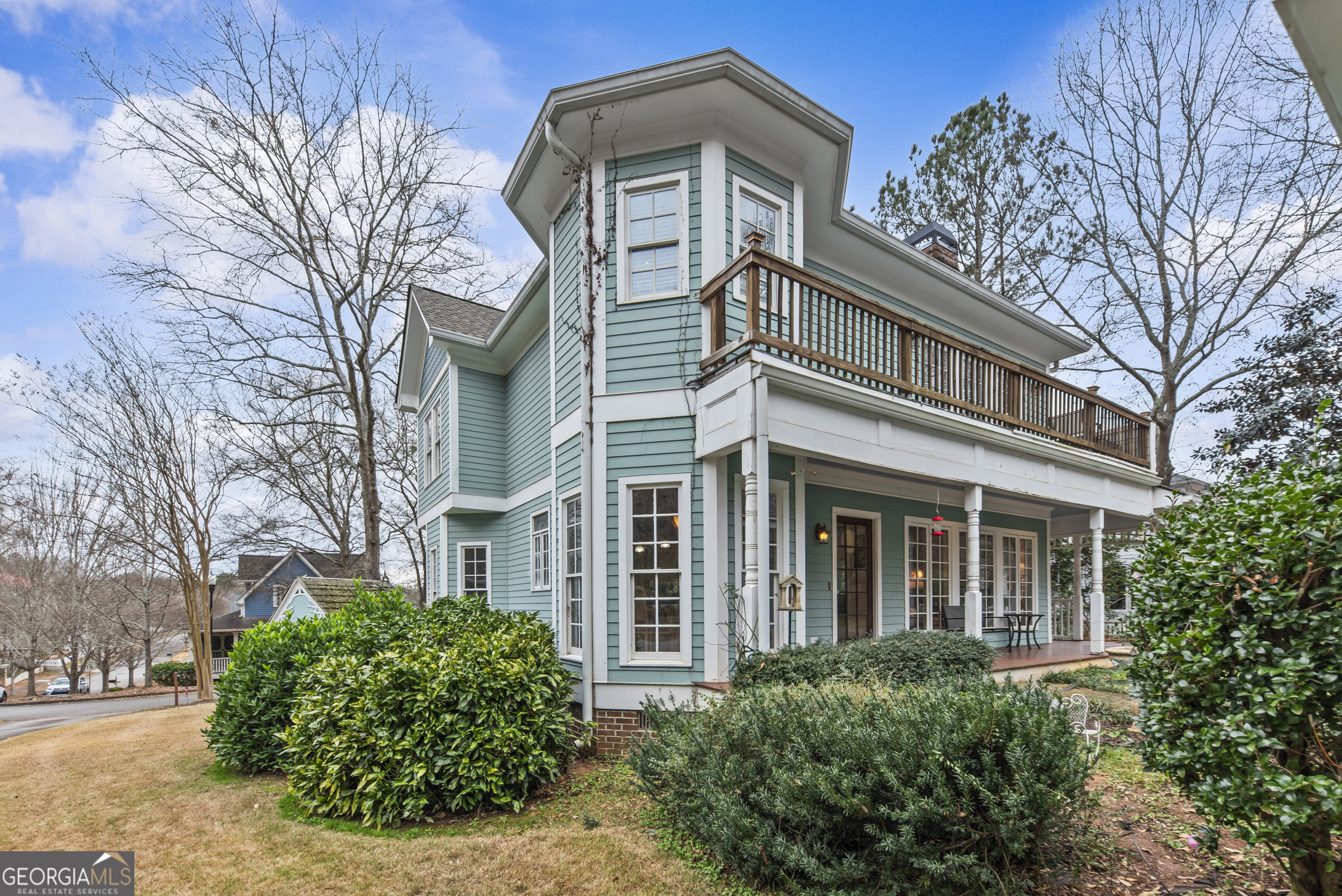 516 Hillside Road Madison, GA 30650 - Photo 25 of 27 front view of a house with a garden