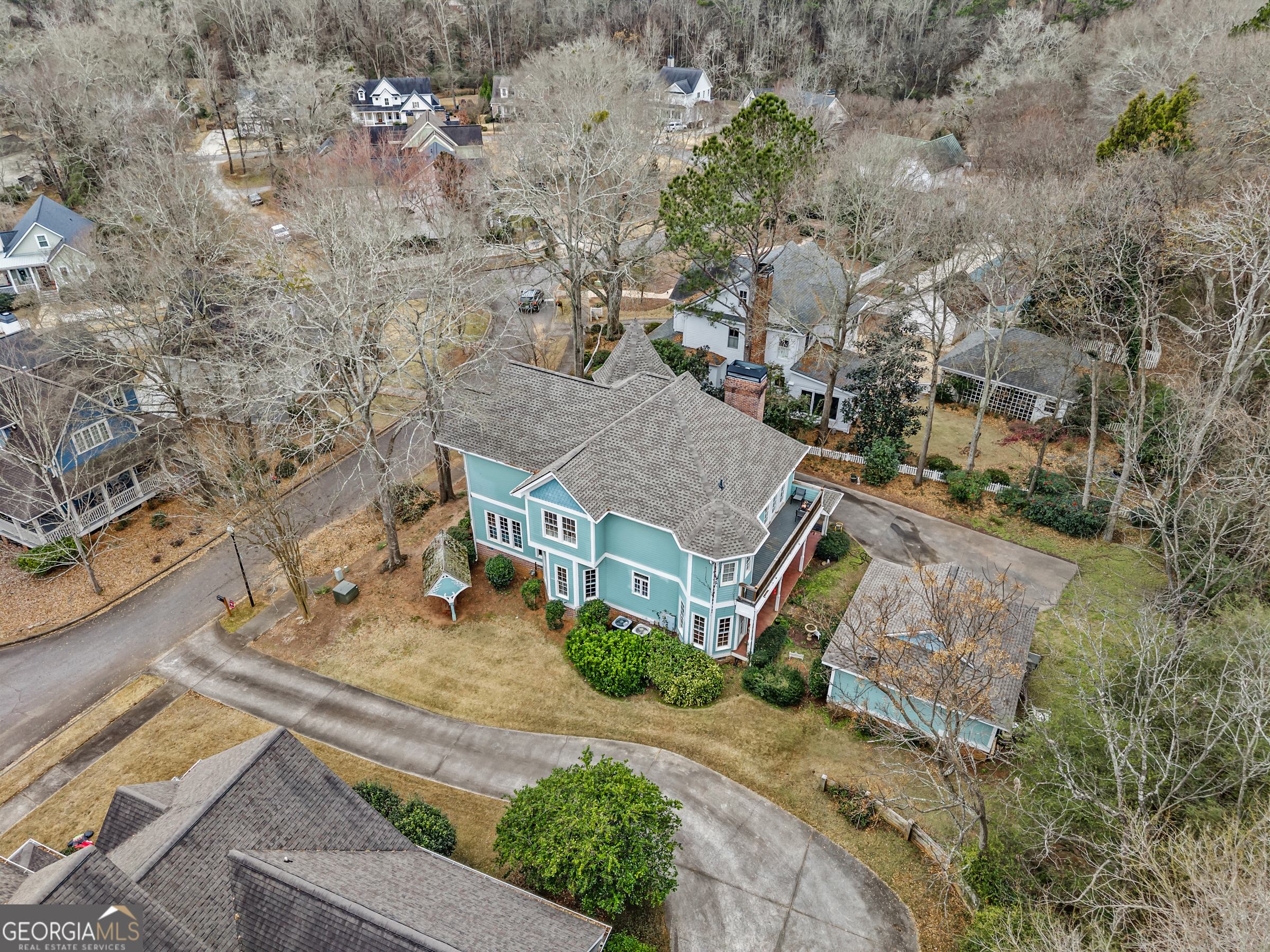 516 Hillside Road Madison, GA 30650 - Photo 3 of 27 an aerial view of a house with a garden