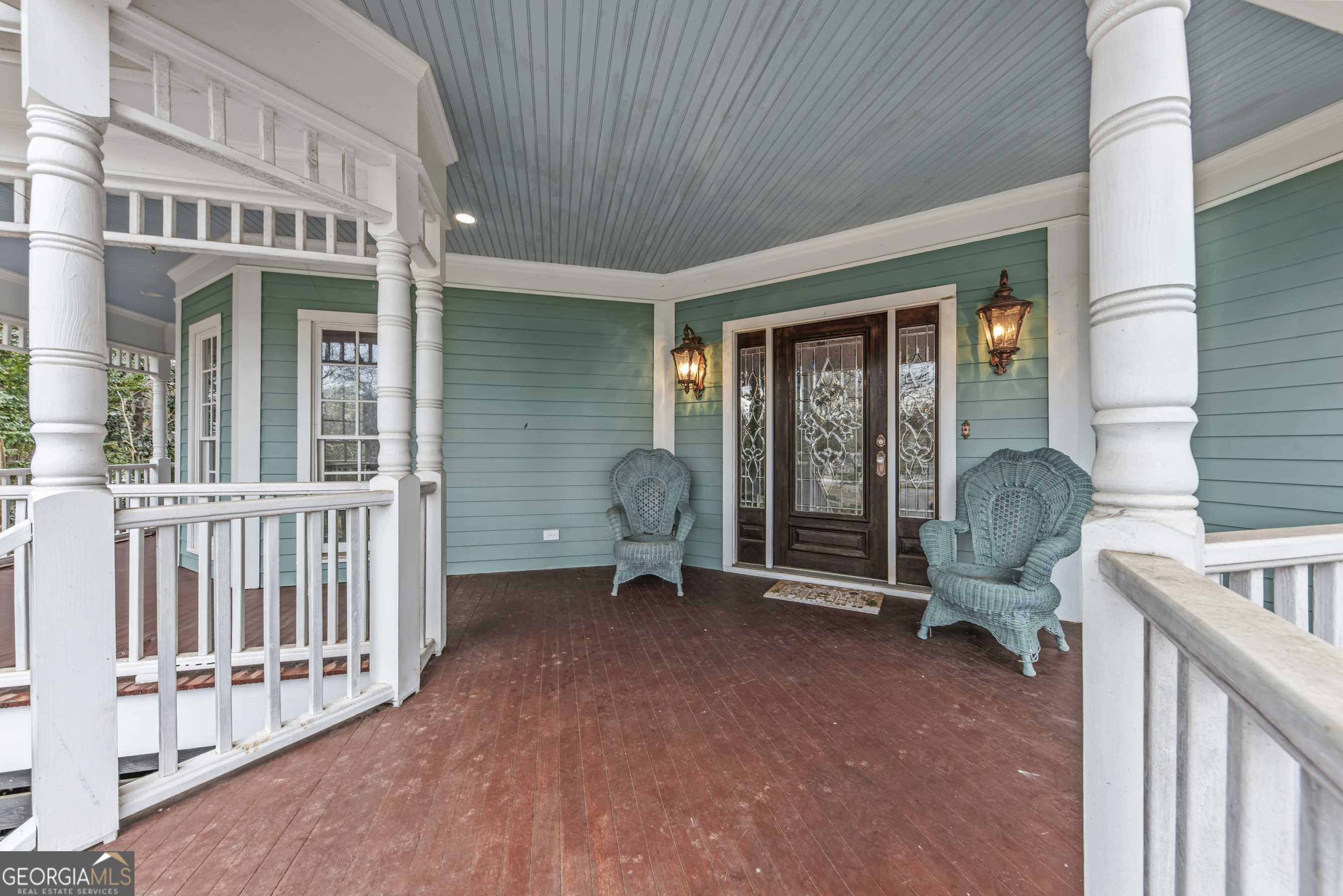 516 Hillside Road Madison, GA 30650 - Photo 4 of 27 a view of a house with porch and furniture