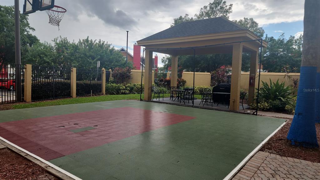 7601 Canada Avenue, Unit 618 Orlando, FL 32819 - Photo 18 of 19 a view of a backyard with garden