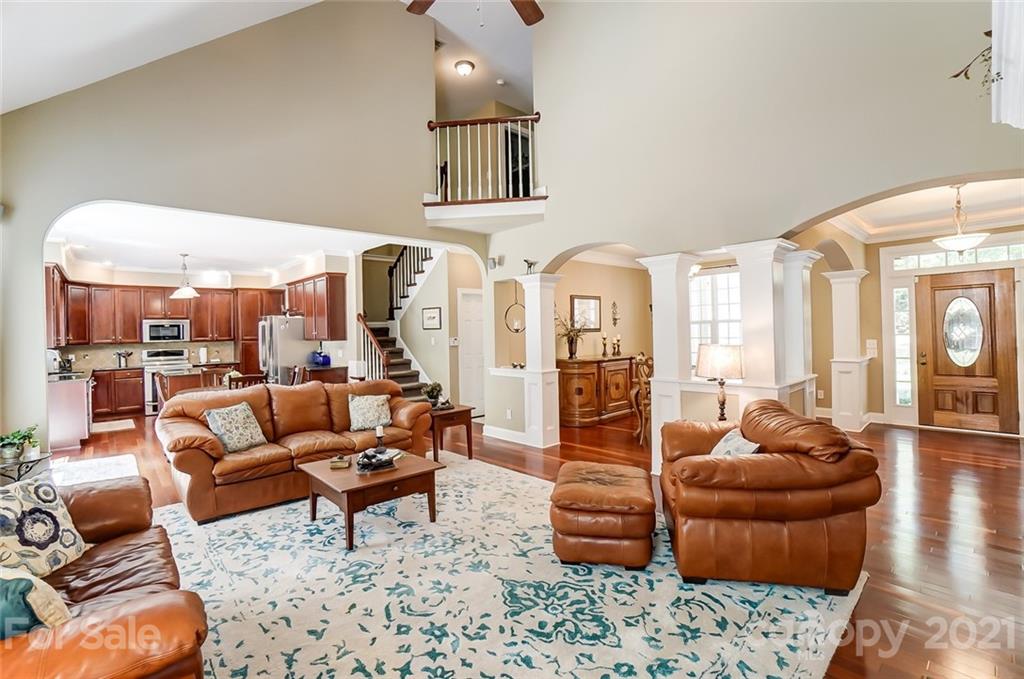 1100 Blacksnake Road Stanley, NC 28164 - Photo 12 of 48 a living room with furniture and a large window