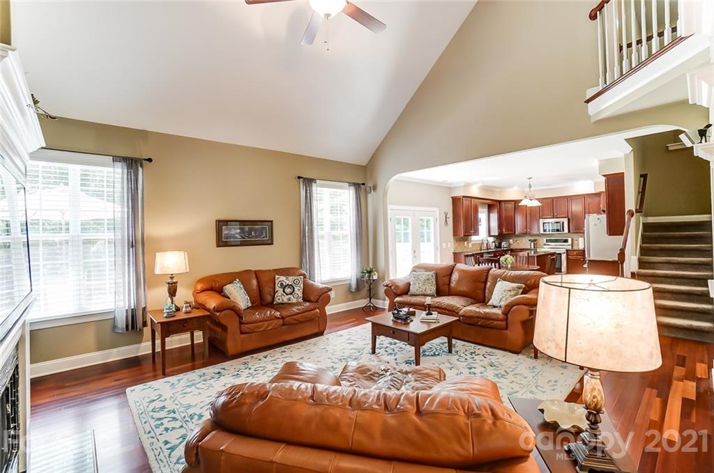 1100 Blacksnake Road Stanley, NC 28164 - Photo 13 of 48 a living room with furniture and a large window