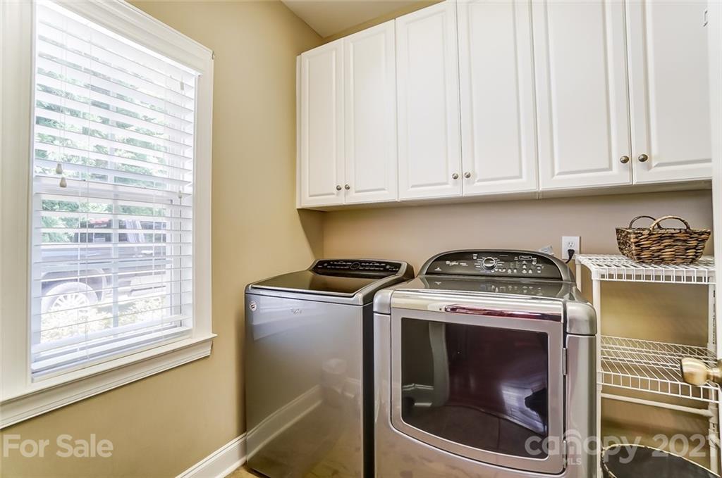 1100 Blacksnake Road Stanley, NC 28164 - Photo 18 of 48 a stove top oven sitting inside of a kitchen