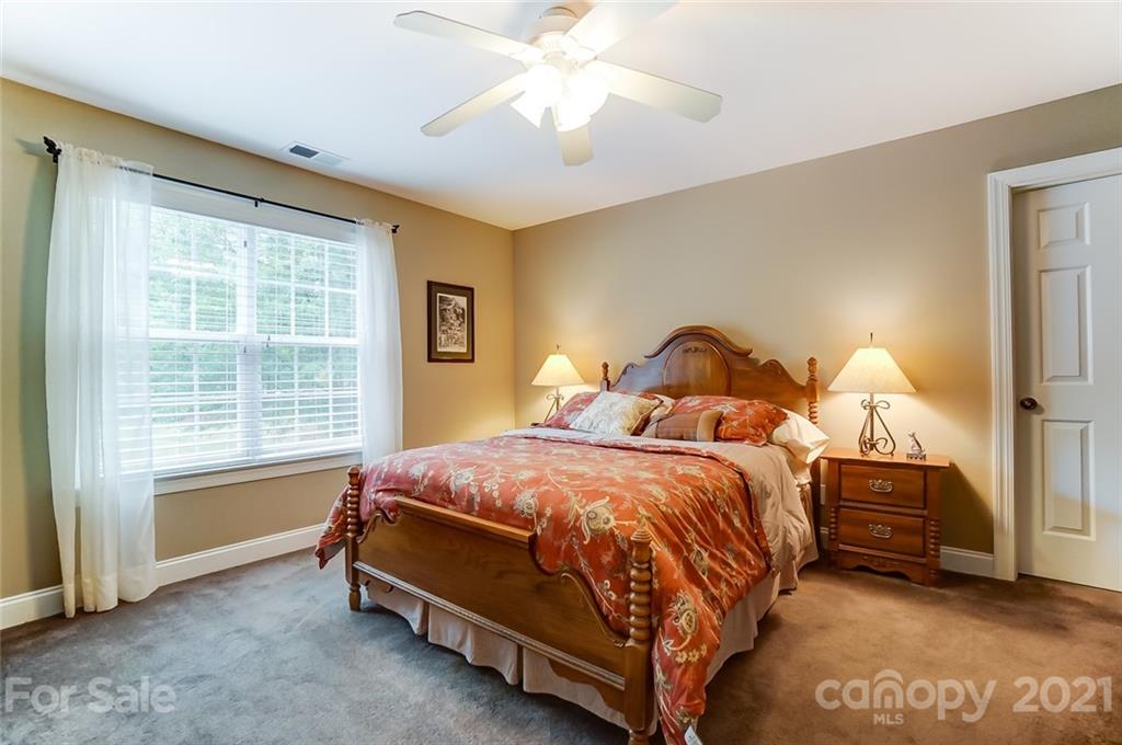 1100 Blacksnake Road Stanley, NC 28164 - Photo 27 of 48 a bedroom with bed and window
