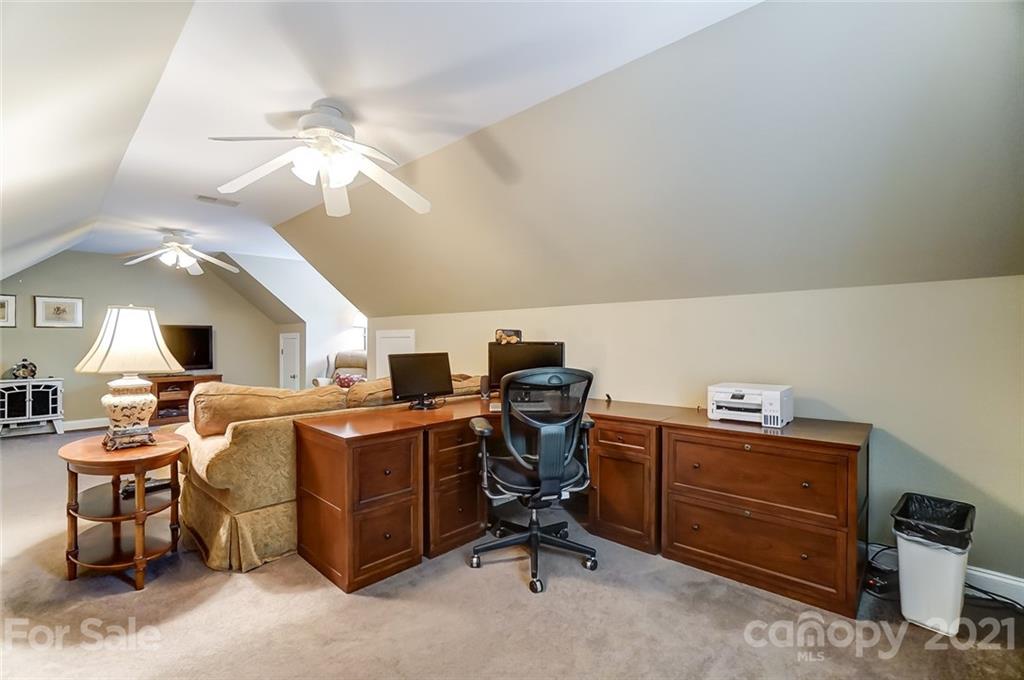 1100 Blacksnake Road Stanley, NC 28164 - Photo 32 of 48 a view of a workspace with furniture