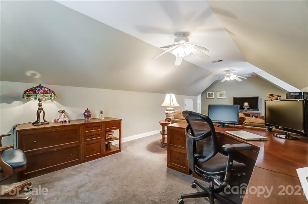 1100 Blacksnake Road Stanley, NC 28164 - Photo 33 of 48 a view of a workspace with furniture