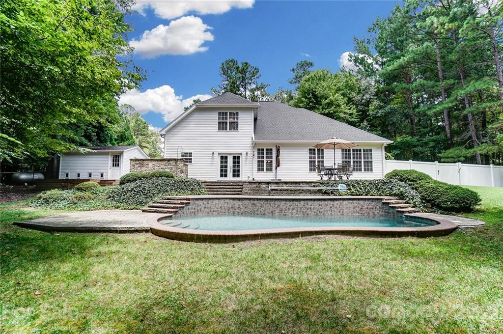 1100 Blacksnake Road Stanley, NC 28164 - Photo 35 of 48 a front view of a house with a yard