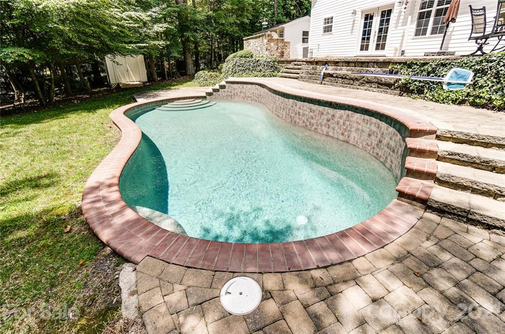 1100 Blacksnake Road Stanley, NC 28164 - Photo 37 of 48 a view of a swimming pool with a yard