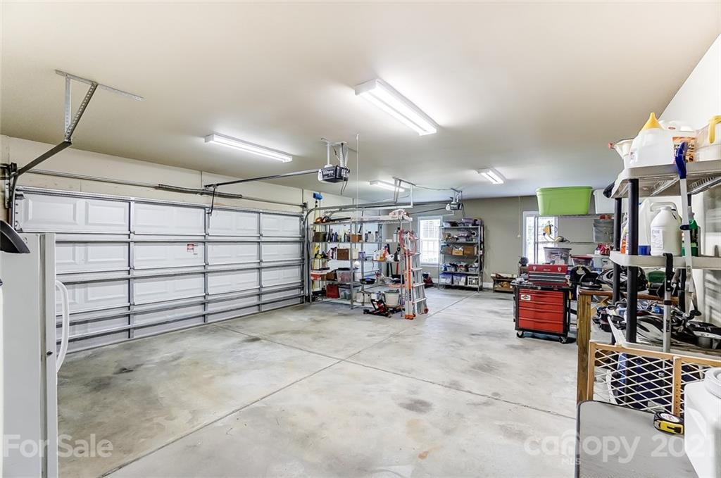 1100 Blacksnake Road Stanley, NC 28164 - Photo 45 of 48 a view of a garage with stuff