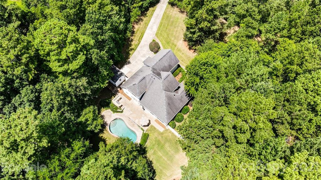 1100 Blacksnake Road Stanley, NC 28164 - Photo 47 of 48 an aerial view of a house with a yard and outdoor seating