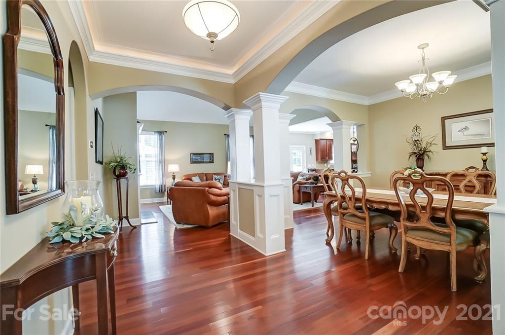 1100 Blacksnake Road Stanley, NC 28164 - Photo 7 of 48 wooden view of a dining room with furniture and wooden floor