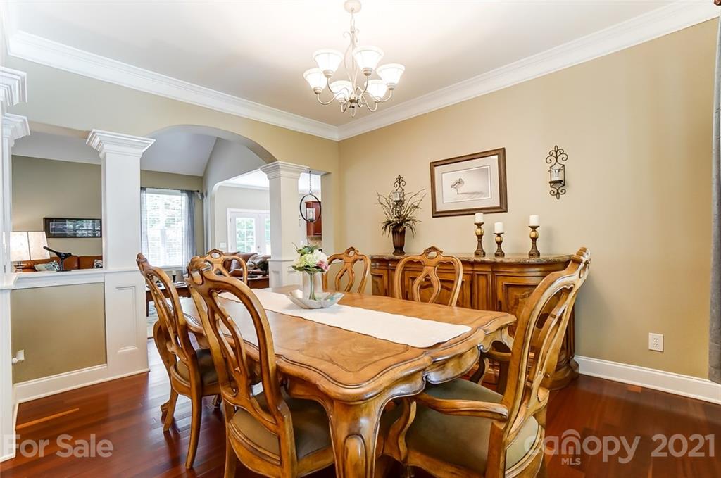 1100 Blacksnake Road Stanley, NC 28164 - Photo 9 of 48 a view of a dining room with furniture and chandelier