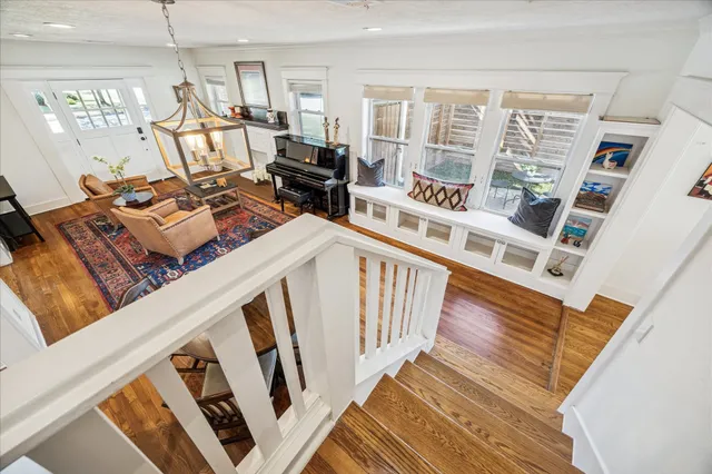 a kitchen with stainless steel appliances a stove a sink and a microwave