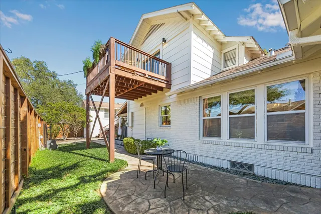 a bathroom with a toilet sink and shower