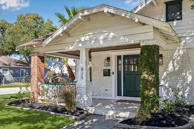 a view of a patio with table and chairs and wooden floor