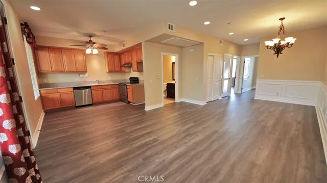 a view of a kitchen and a chandelier