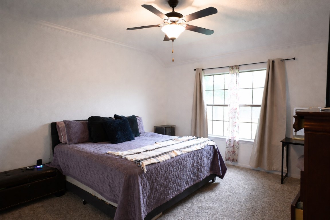 250 7th Street Hempstead, TX 77445 - Photo 13 of 26 a bedroom with a bed and window