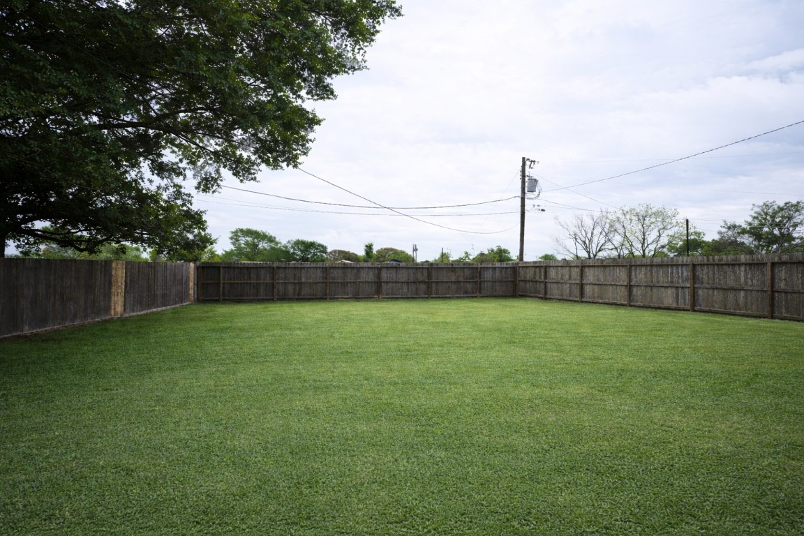 250 7th Street Hempstead, TX 77445 - Photo 25 of 26 a view of a green field with a tree