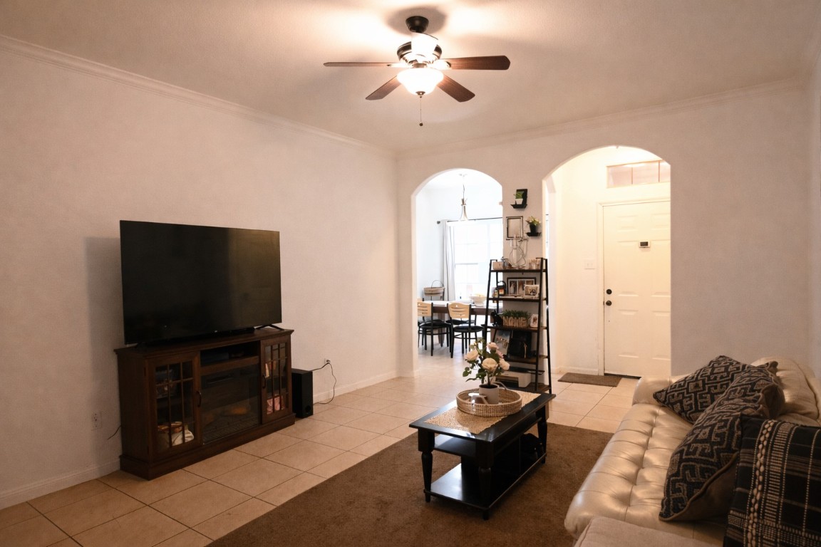 250 7th Street Hempstead, TX 77445 - Photo 6 of 26 a living room with furniture and a flat screen tv