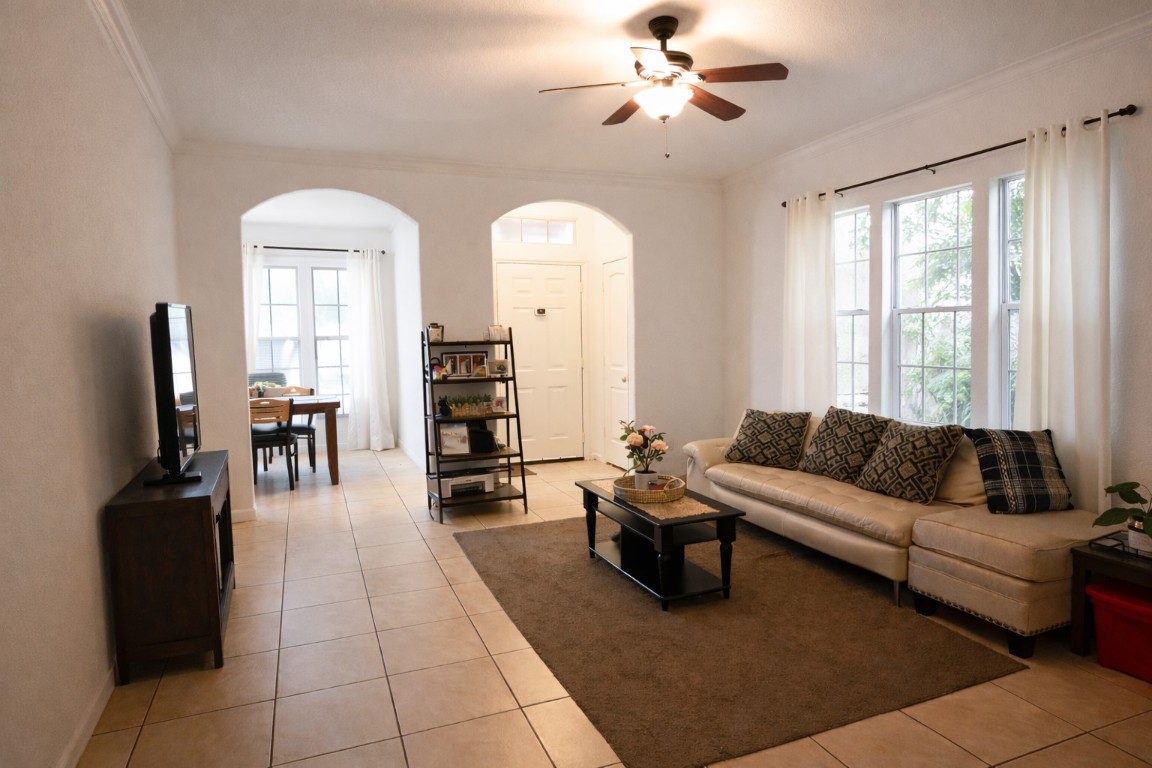 250 7th Street Hempstead, TX 77445 - Photo 7 of 26 a living room with fireplace furniture and a flat screen tv