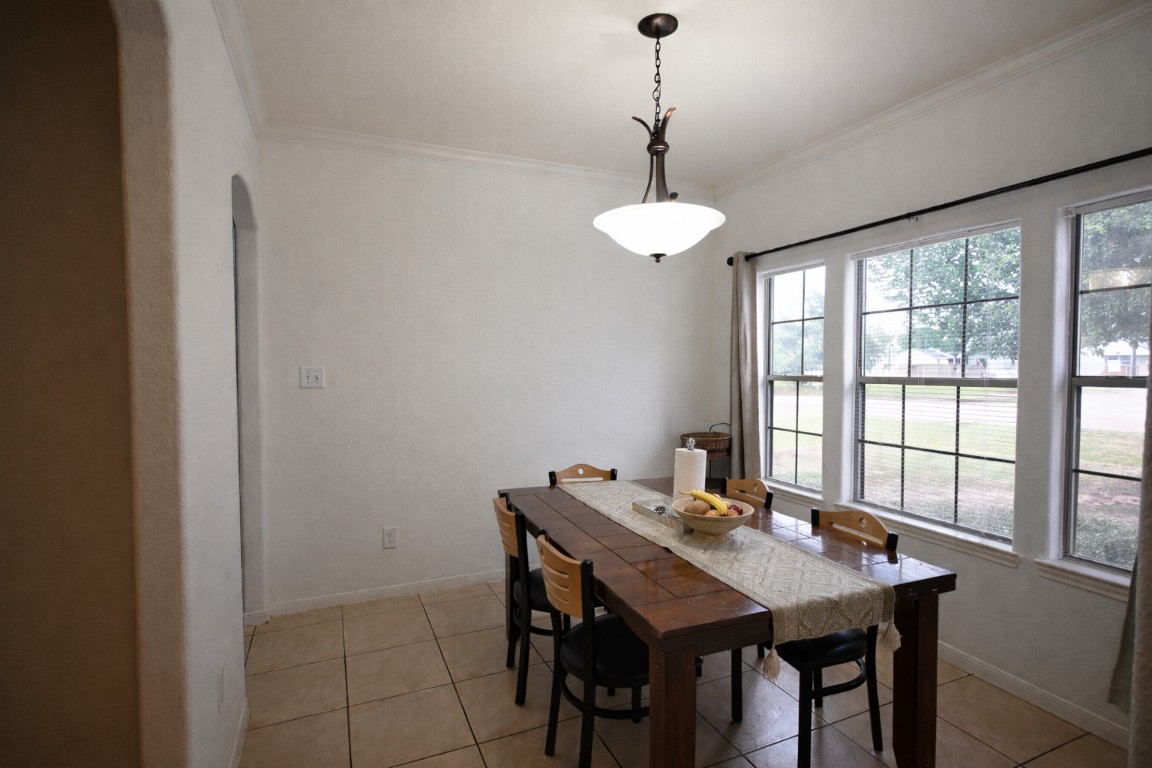 250 7th Street Hempstead, TX 77445 - Photo 9 of 26 a view of a dining room with furniture window and outside view