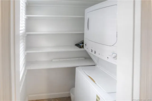 a utility room with cabinets
