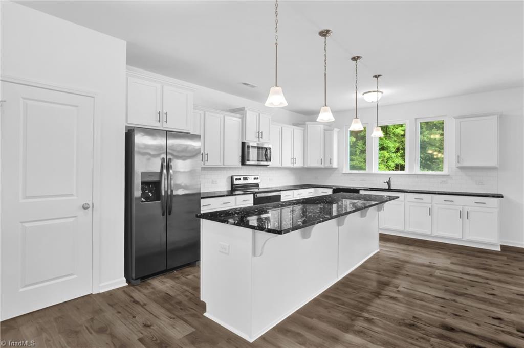 4038 Monteray Circle High Point, NC 27265 - Photo 7 of 19 Beautiful white cabinets and granite countertops