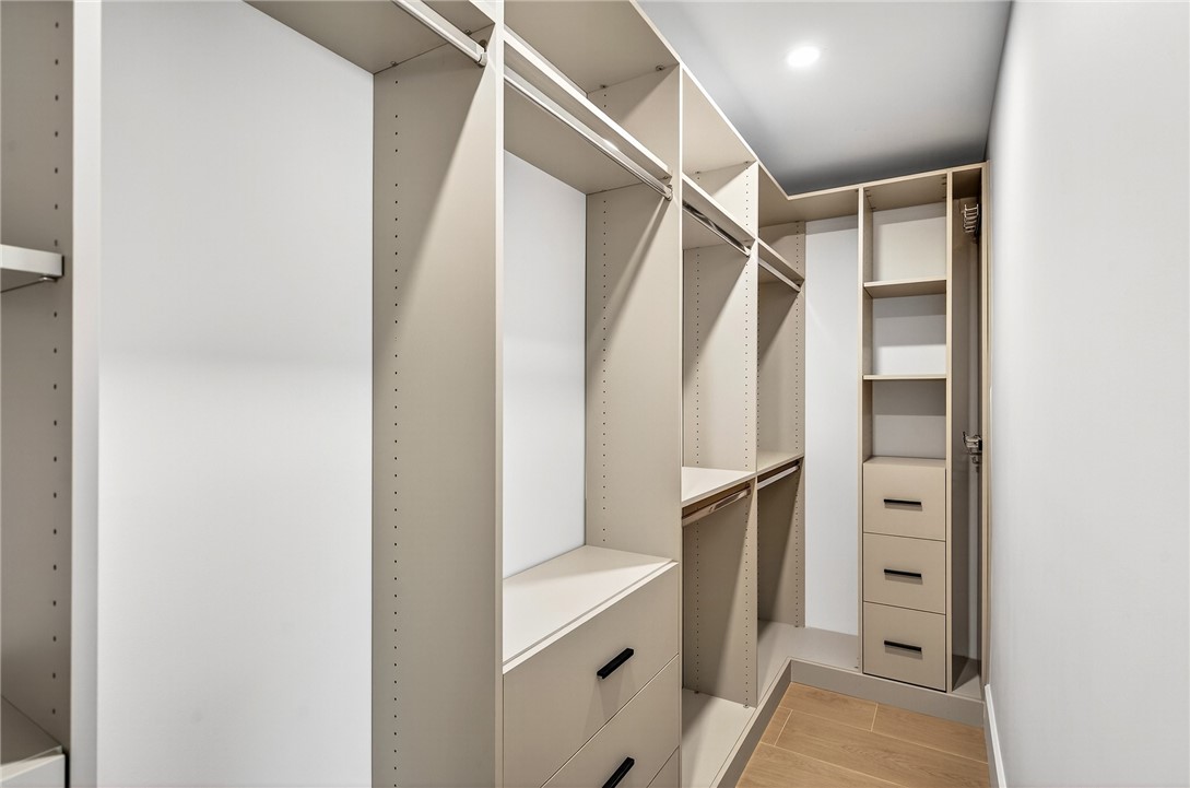 661 Date Palm Road Vero Beach, FL 32963 - Photo 19 of 34 a view of walk in closet with empty racks