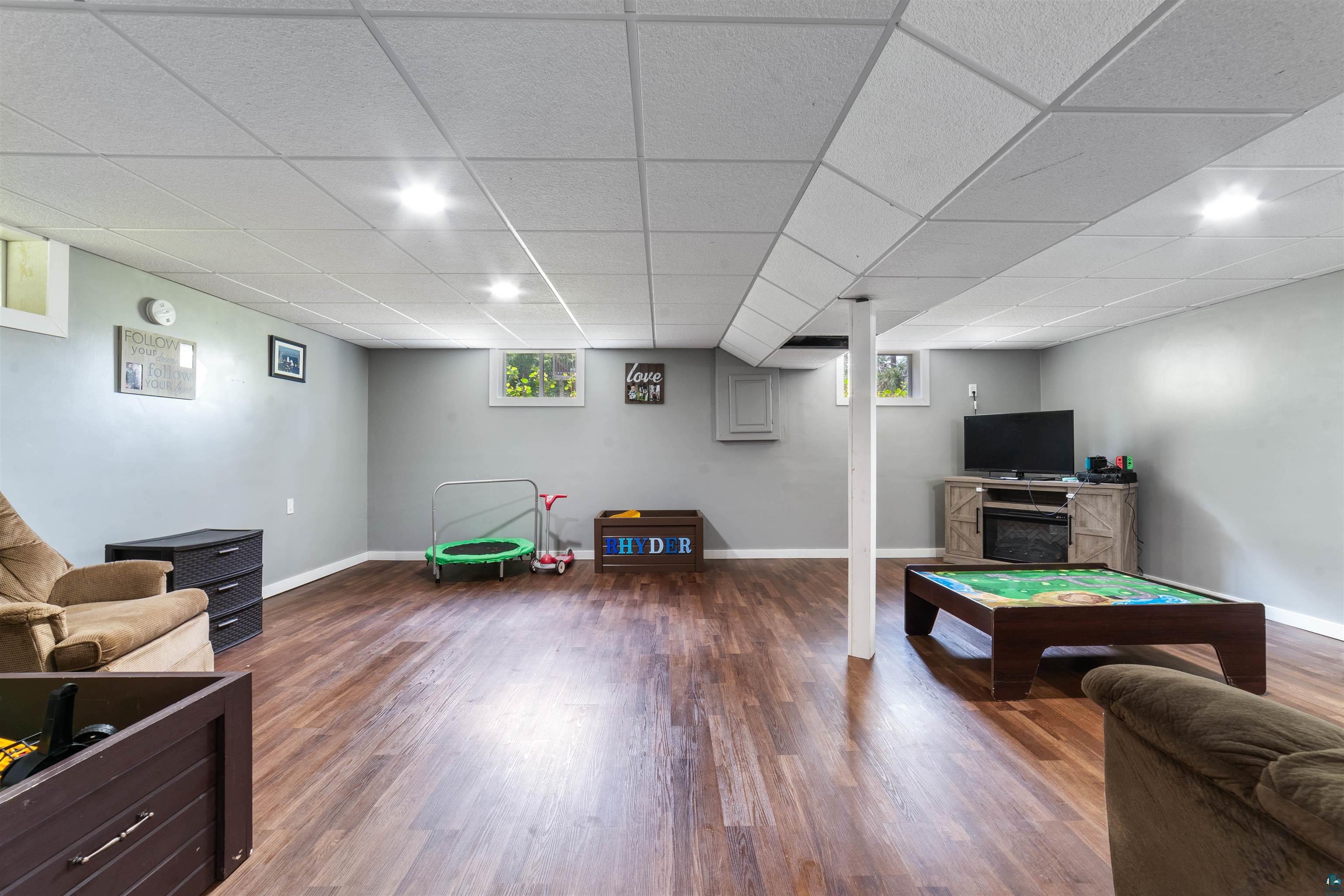 5716 North Pike Lake Road Duluth, MN 55811 - Photo 19 of 31 Rec room featuring a paneled ceiling, dark hardwood / wood-style flooring, and billiards