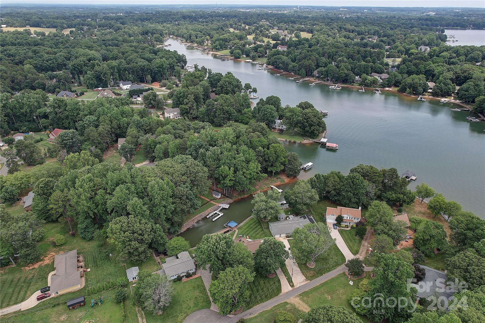 122 Stover Road Mooresville, NC 28117 - Photo 11 of 17 an aerial view of a house with a yard and lake view