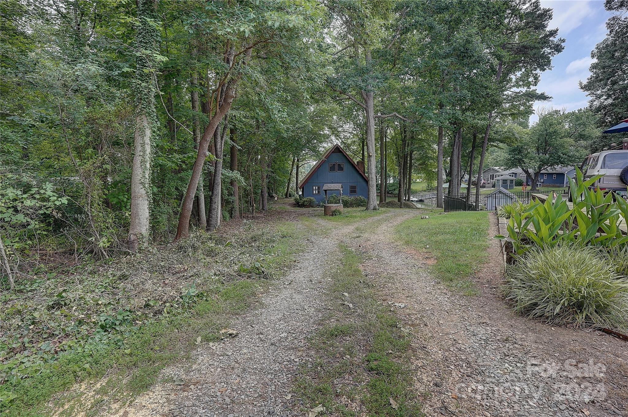 122 Stover Road Mooresville, NC 28117 - Photo 12 of 17 a view of a park with large trees