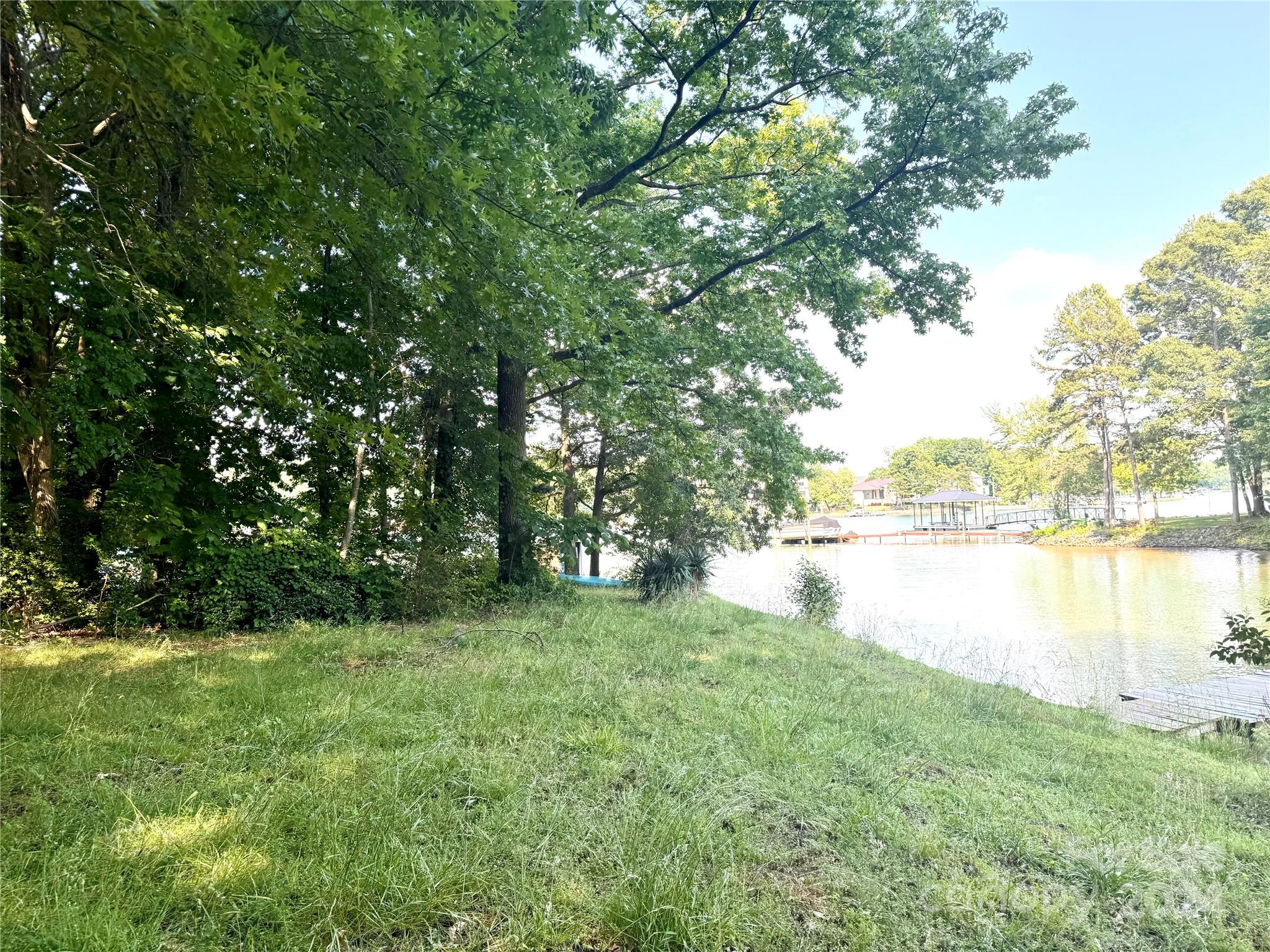 122 Stover Road Mooresville, NC 28117 - Photo 2 of 17 a view of a lake with houses in outdoor space