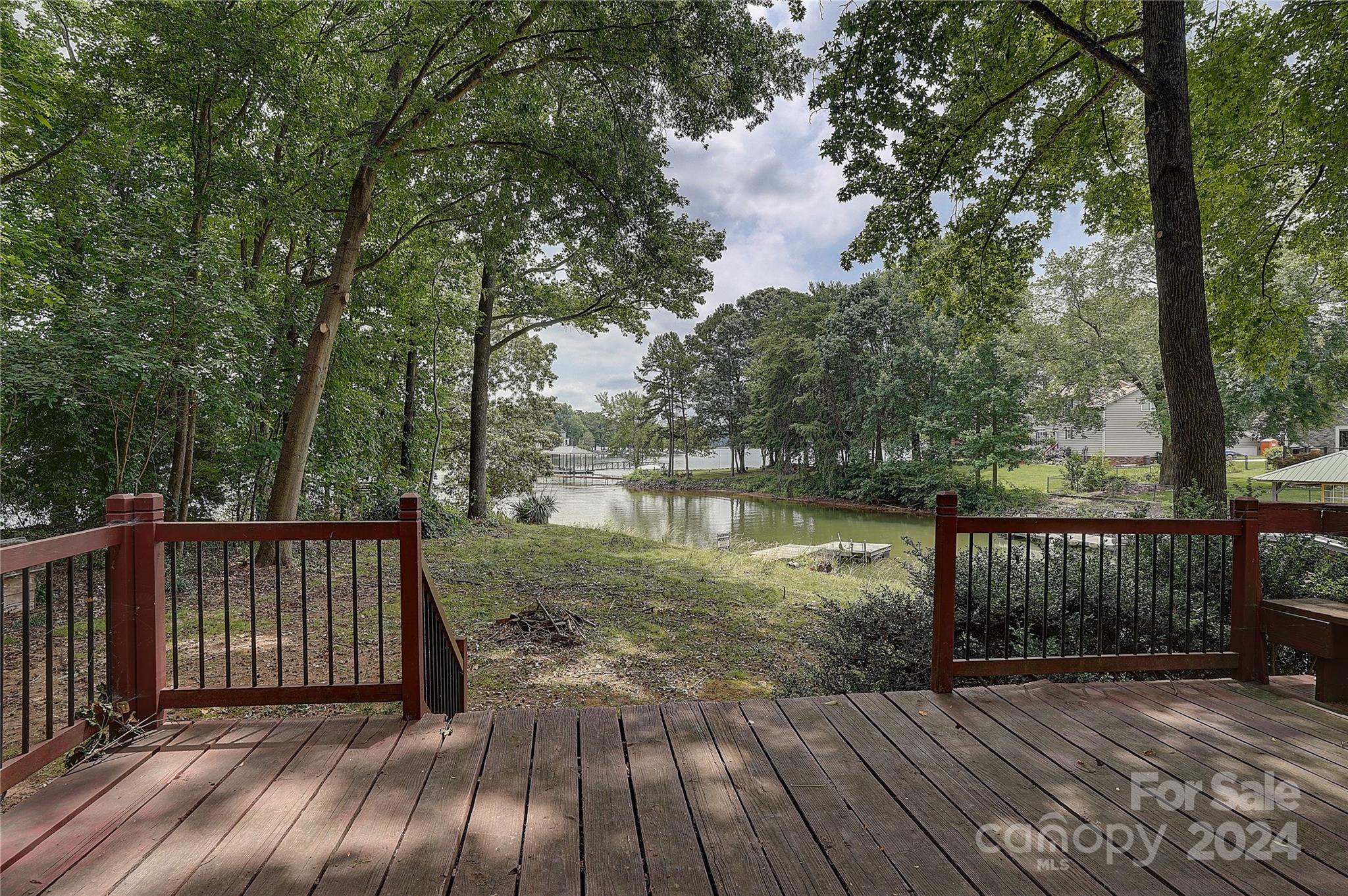 122 Stover Road Mooresville, NC 28117 - Photo 3 of 17 a view of backyard with deck and garden