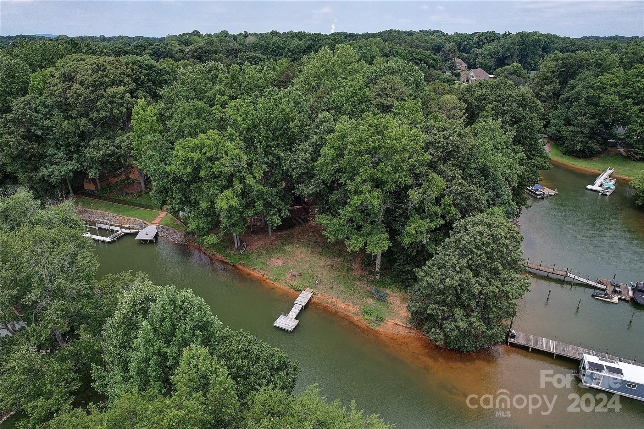 122 Stover Road Mooresville, NC 28117 - Photo 7 of 17 an aerial view of lake residential house with outdoor space and trees all around