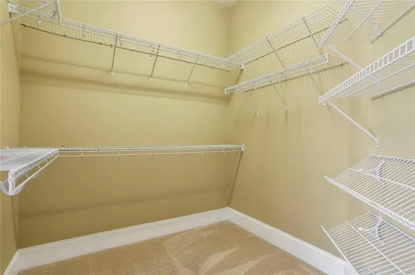 a view of a room with racks on the wall