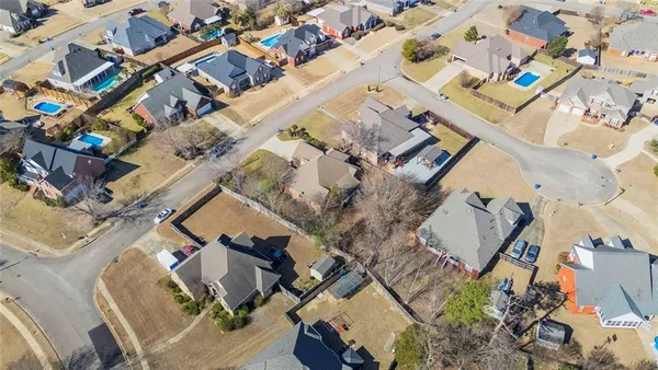 an aerial view of a building with multiple yard