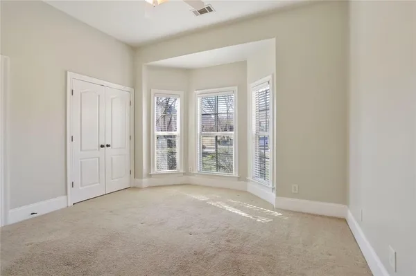 an empty room with windows