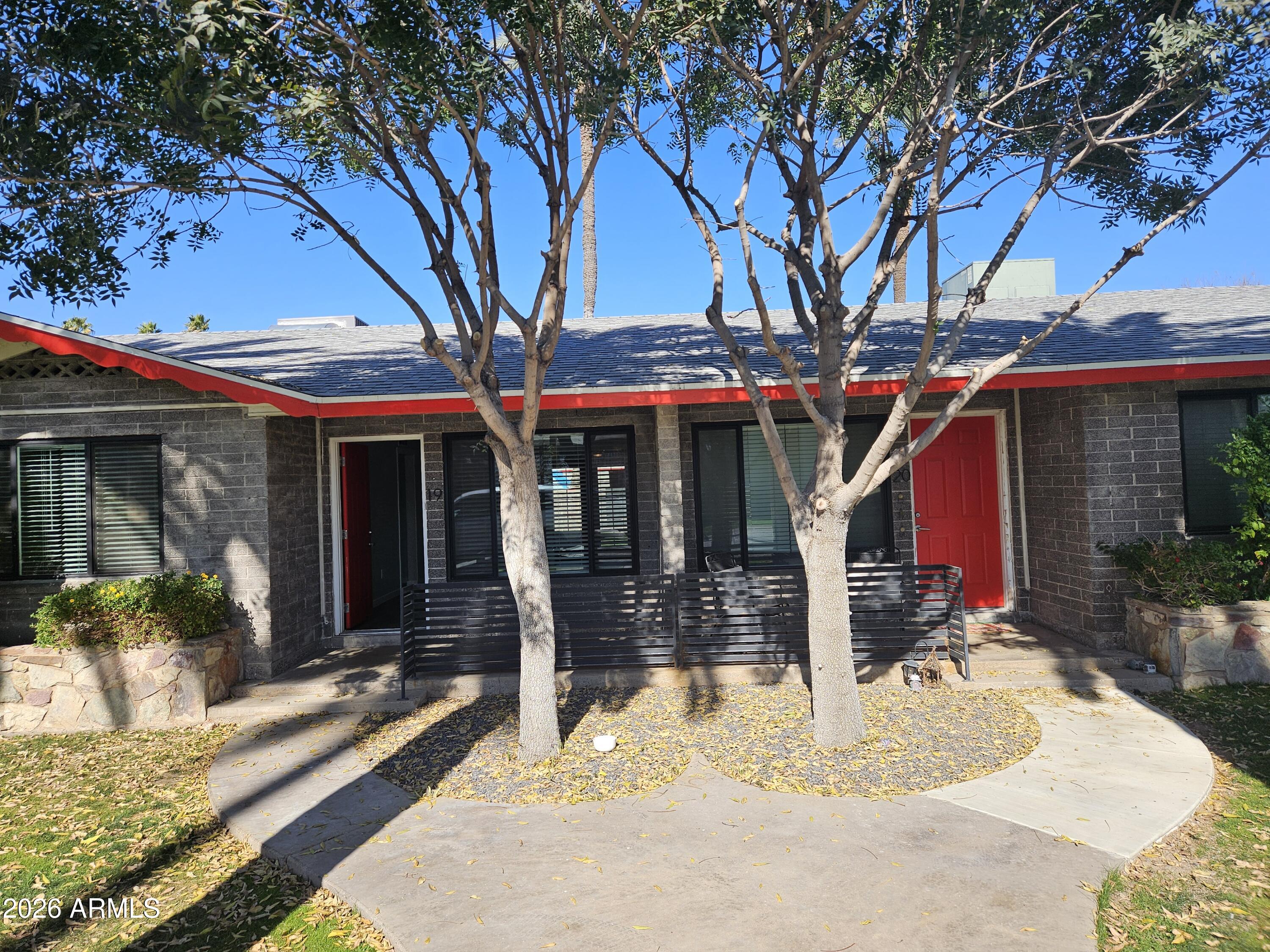 324 West Pasadena Avenue, Unit 8 Phoenix, AZ 85013 - Photo 1 of 22 a view of a cafe with sitting area