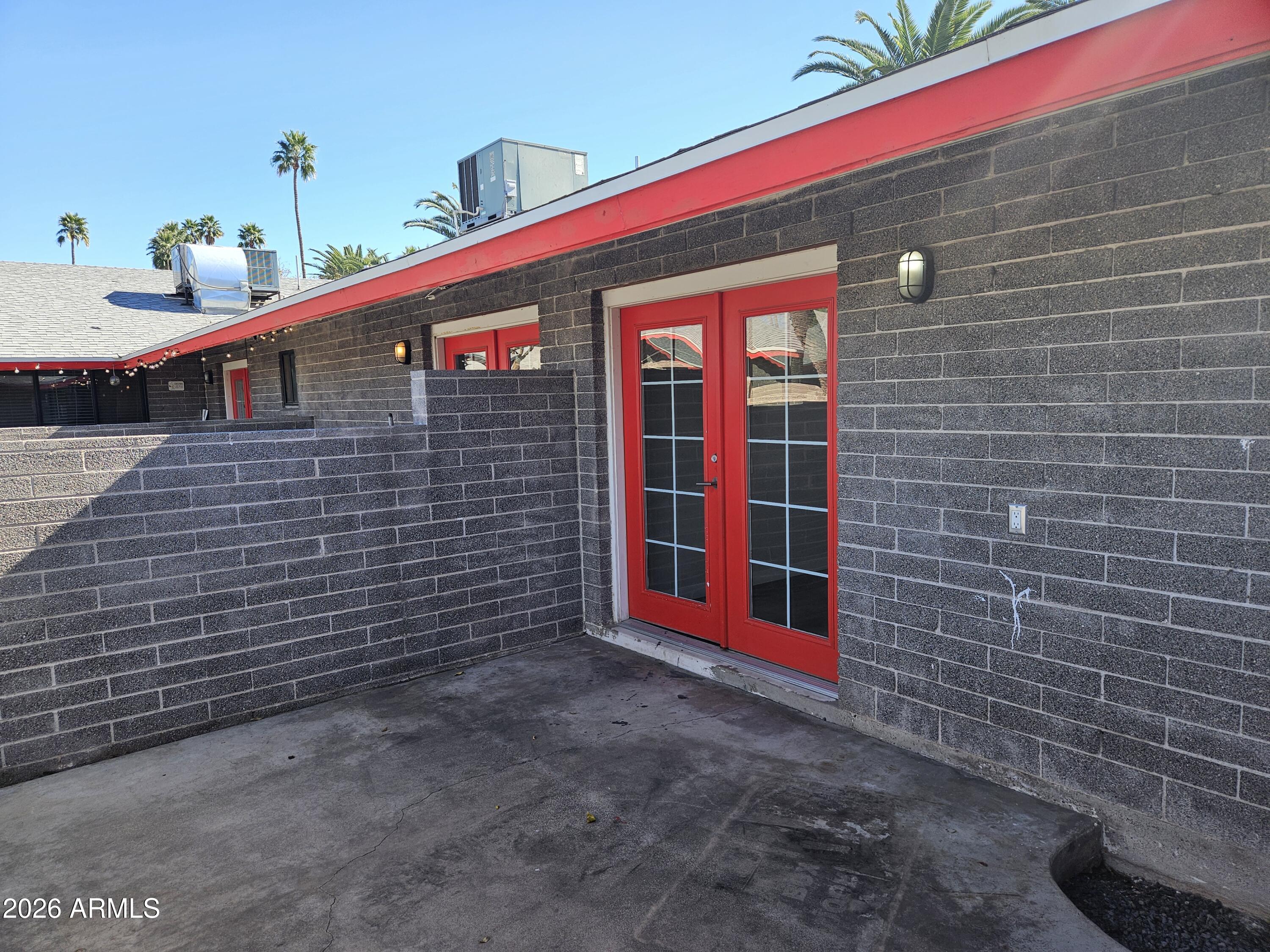 324 West Pasadena Avenue, Unit 8 Phoenix, AZ 85013 - Photo 19 of 22 a view of a house with a yard