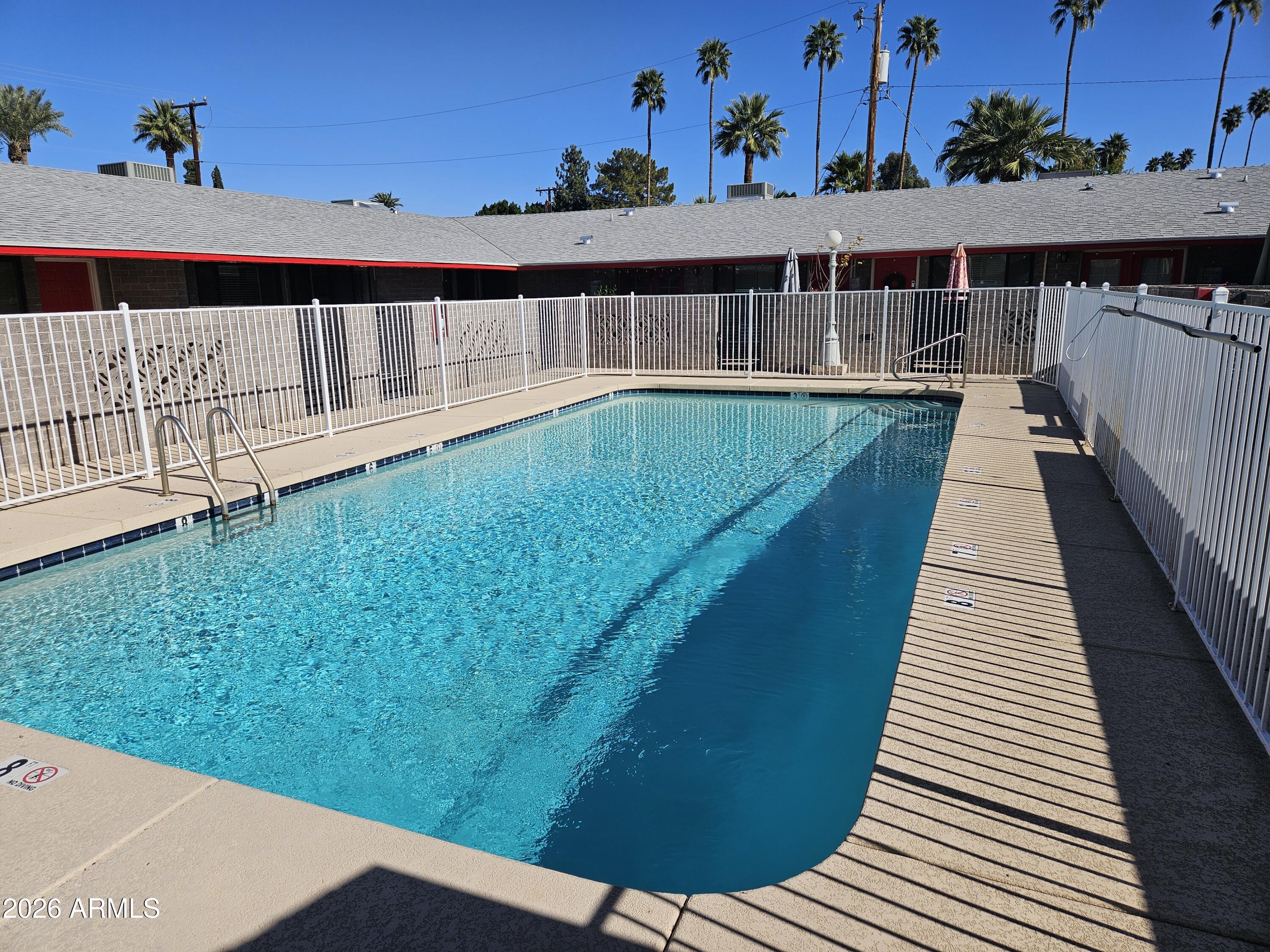 324 West Pasadena Avenue, Unit 8 Phoenix, AZ 85013 - Photo 21 of 22 a view of balcony with wooden floor