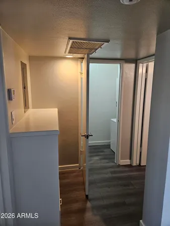 a bathroom with a mirror and a shower