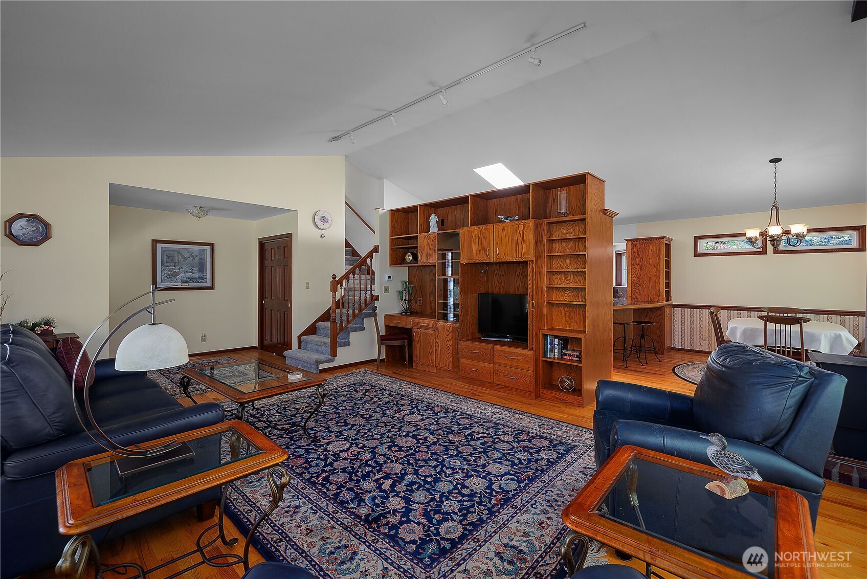5629 Sleater Kinney Road Northeast Olympia, WA 98506 - Photo 13 of 32 a living room with furniture and wooden floor